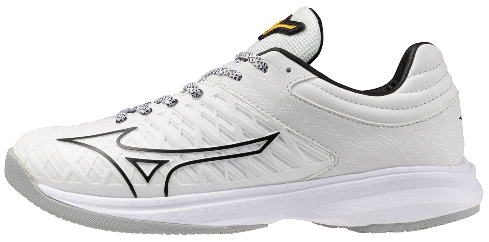 White sneaker with green accents on a white background
