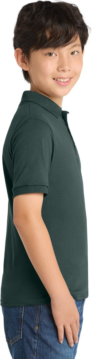 Dark Green Port & Co Youth Core Blend Jersey Knit Polo. KP55Y