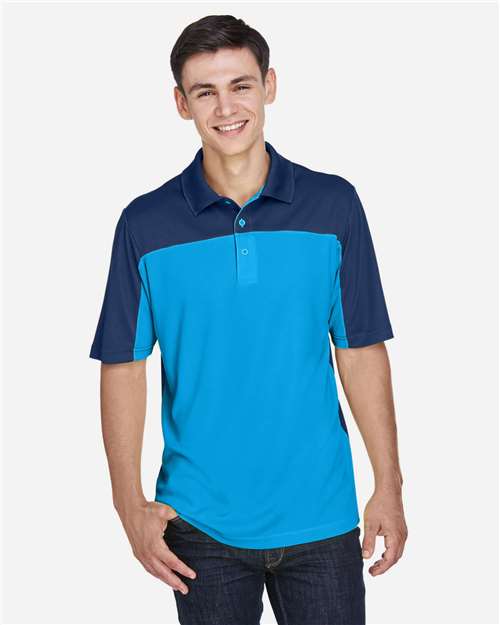Rear View of Electric Blue/ Classic Navy Men's Balance Colorblock Performance Piqué Polo - CE101
