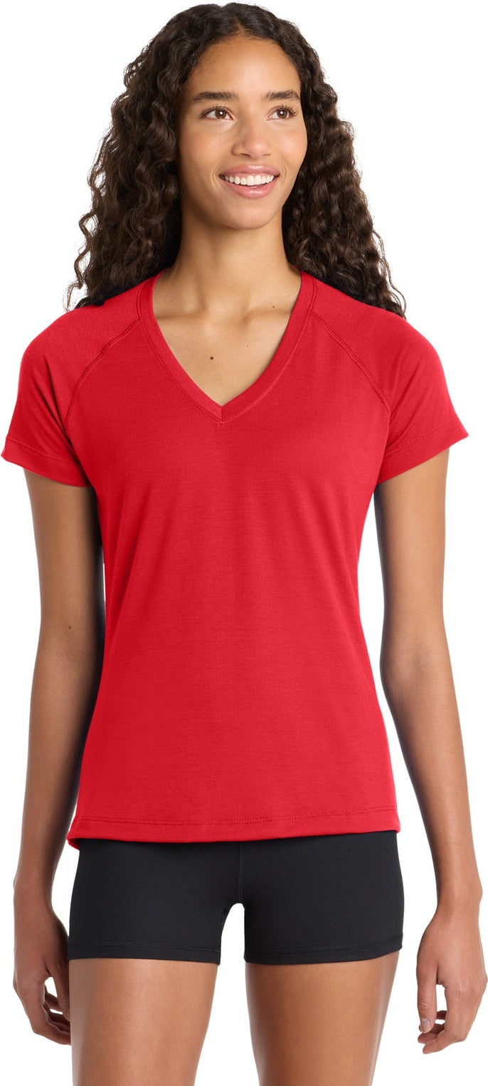 Front View of True Red Sport-Tek Women's Ultimate Performance V-Neck. LST700
