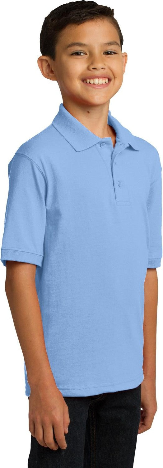 Light Blue Port & Co Youth Core Blend Jersey Knit Polo. KP55Y