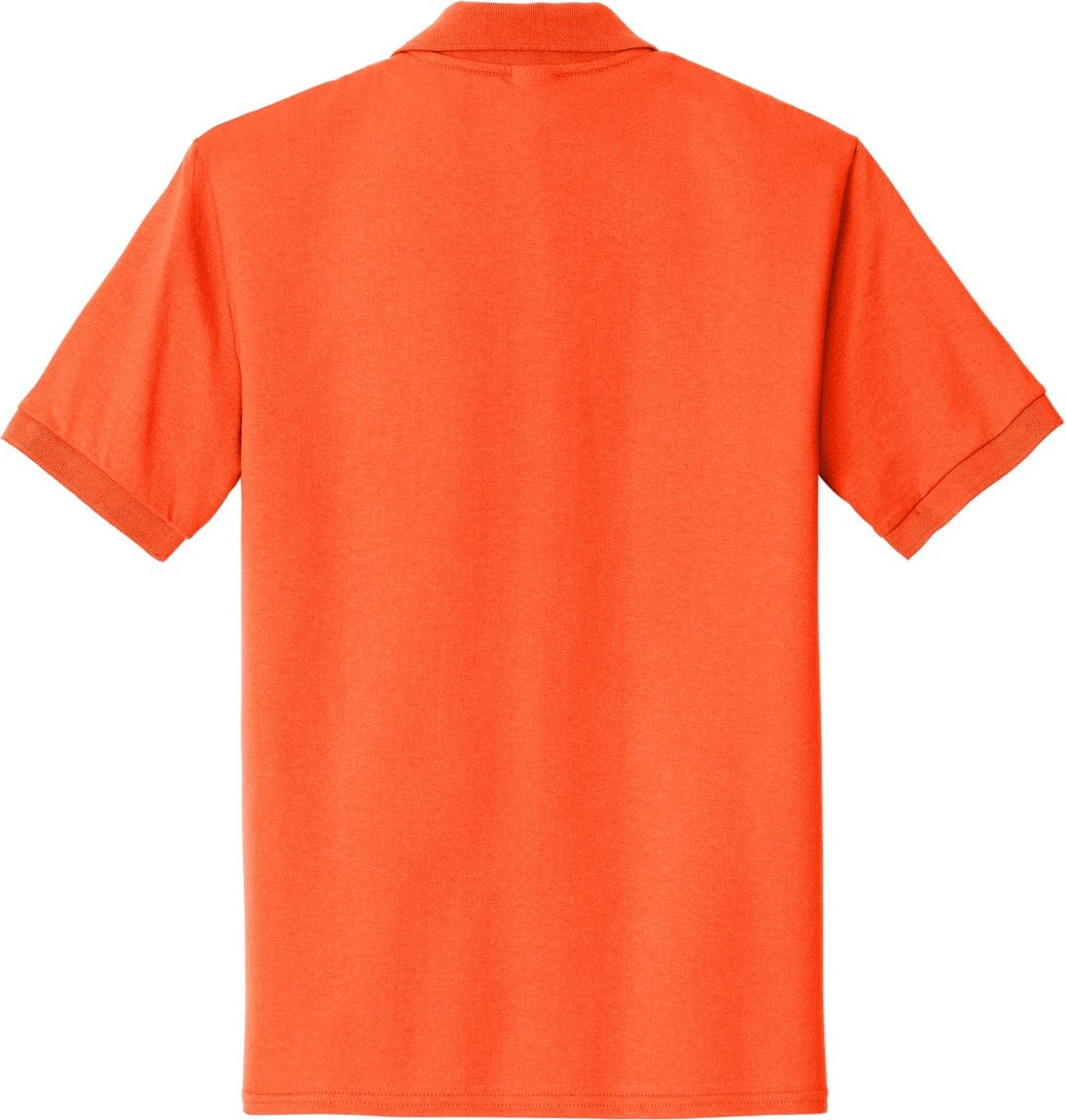 Front View of Safety Orange Port & Co Core Blend Jersey Knit Pocket Polo. KP55P