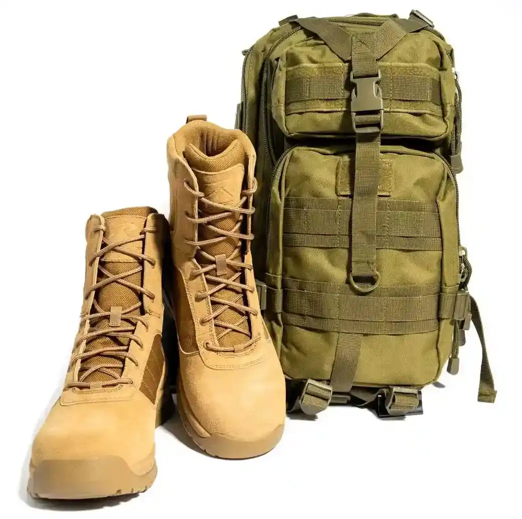 Tan suede combat boots with matching laces and reinforced stitching, paired with a olive green tactical backpack featuring multiple molle webbing straps.