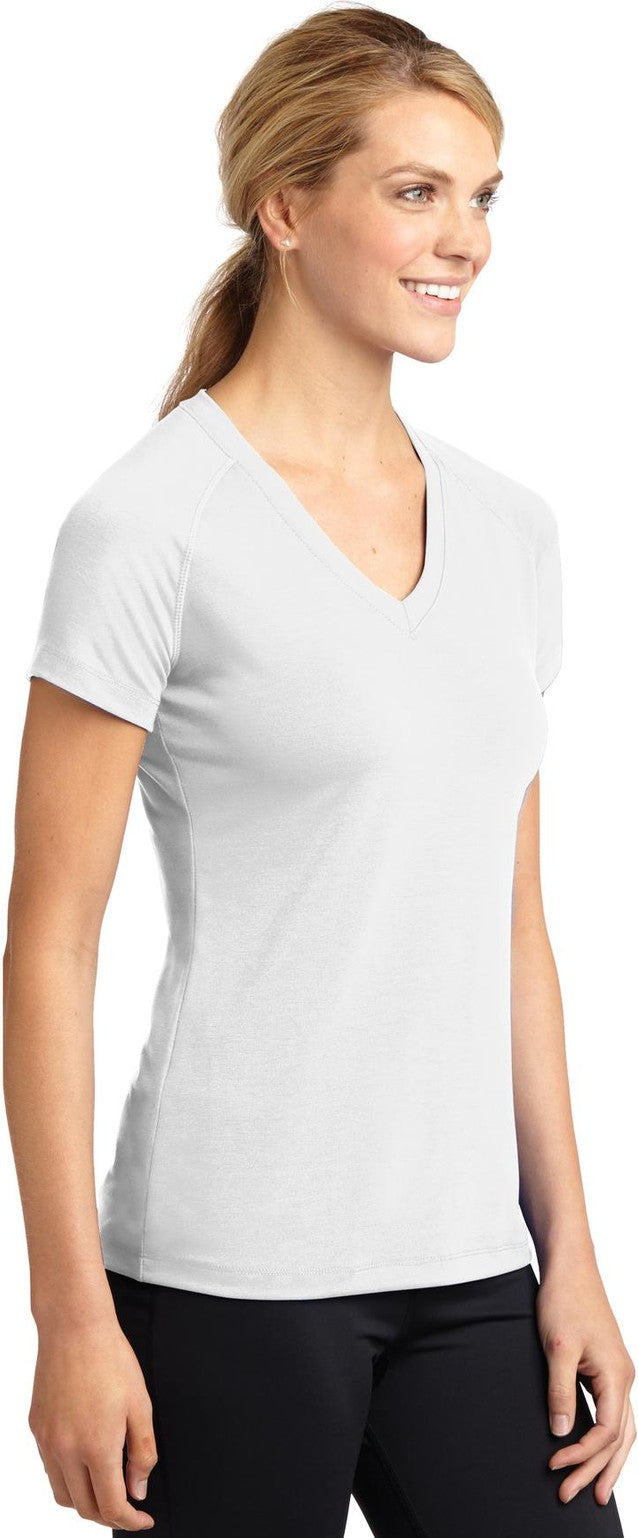 White Sport-Tek Women's Ultimate Performance V-Neck. LST700